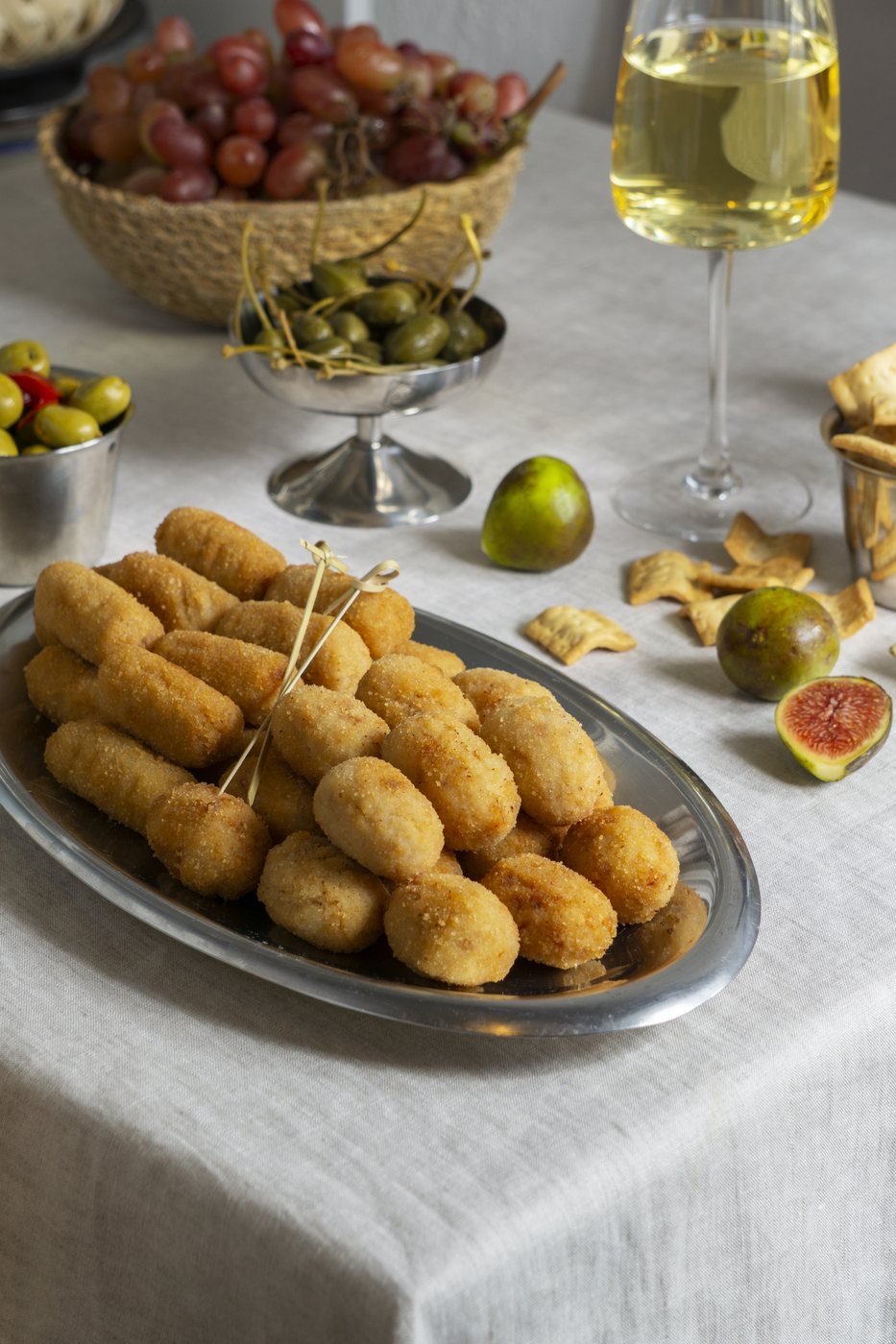 Brazilian salgados served on a silver tray