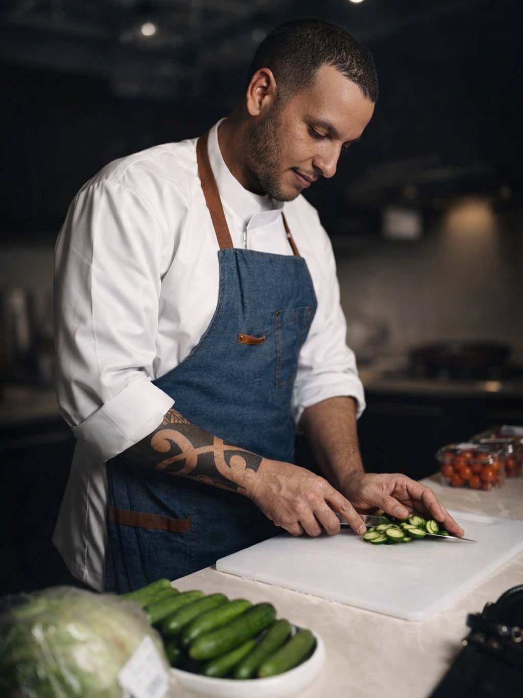 Chef Felipe Sharp preparing ingredients for a private chef experience